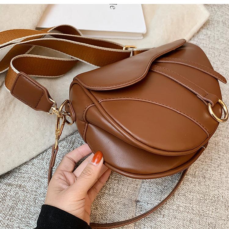 ladies brown saddle handbag