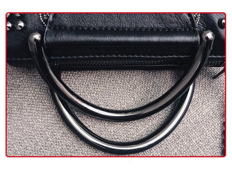 black handbag handle view