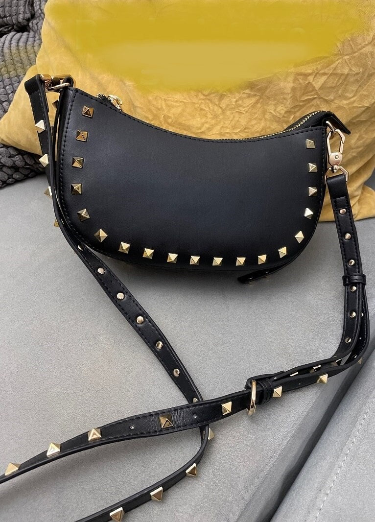 ladies genuine leather bag with rivet detail