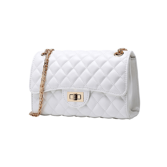 white luxury bag with gold strap