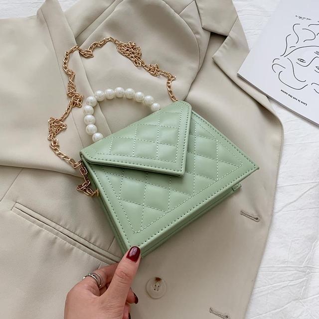 mini bag with pearl handle detail