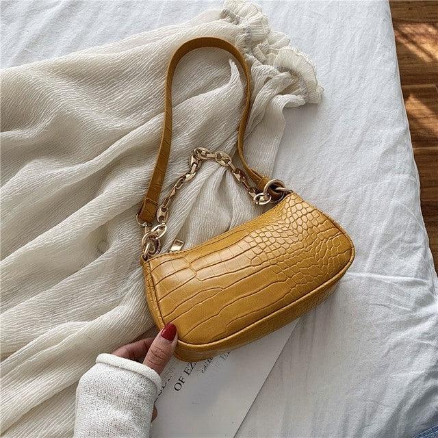 baguette bag with gold chain detail