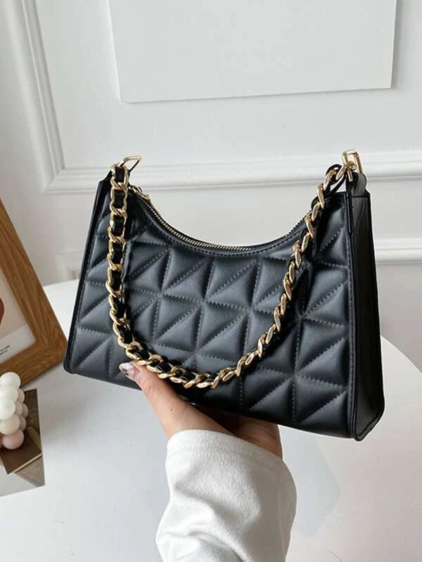 black bag with leather threaded chain strap