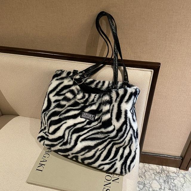 ladies plush animal print handbag