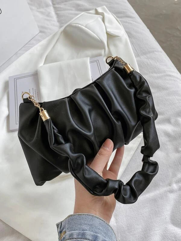 black bag with gold detail