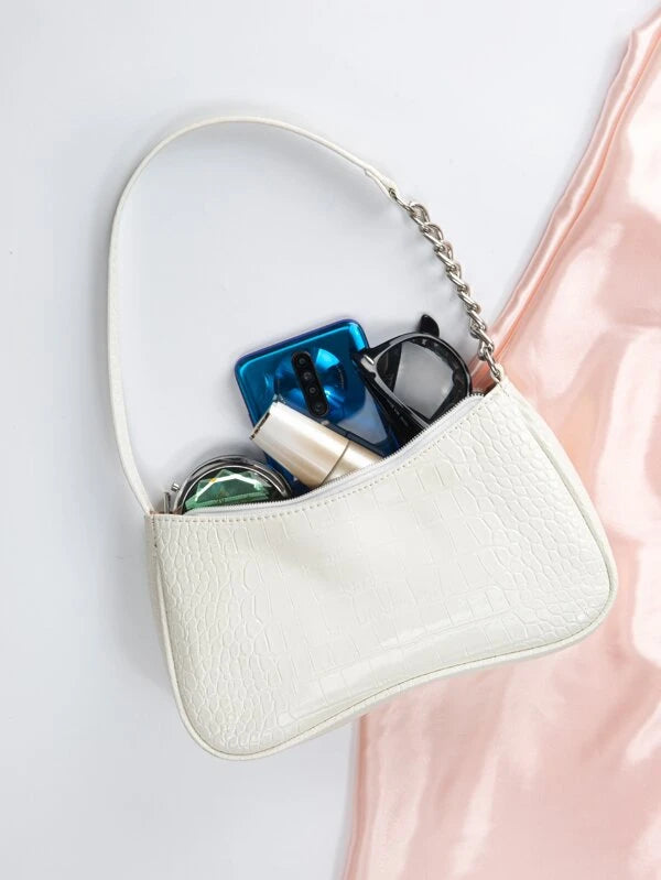 white baguette bag with chain detail